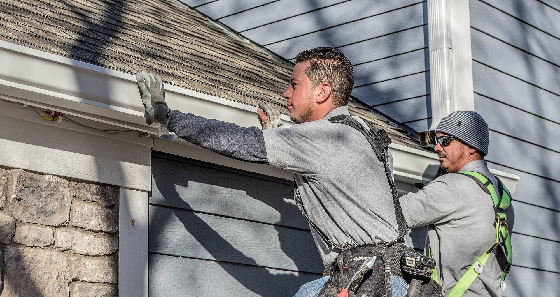 Gutter contractor at work