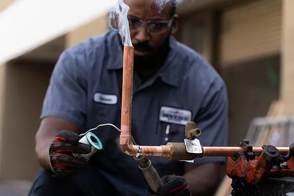 Plumber at work